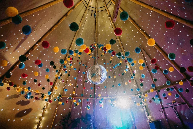 Tent ceiling decorated with colourful hanging lanterns — example for events in Bowdon