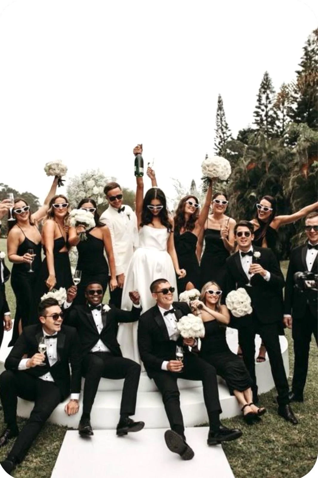Wedding party celebrating outside a marquee — example for events in Hale