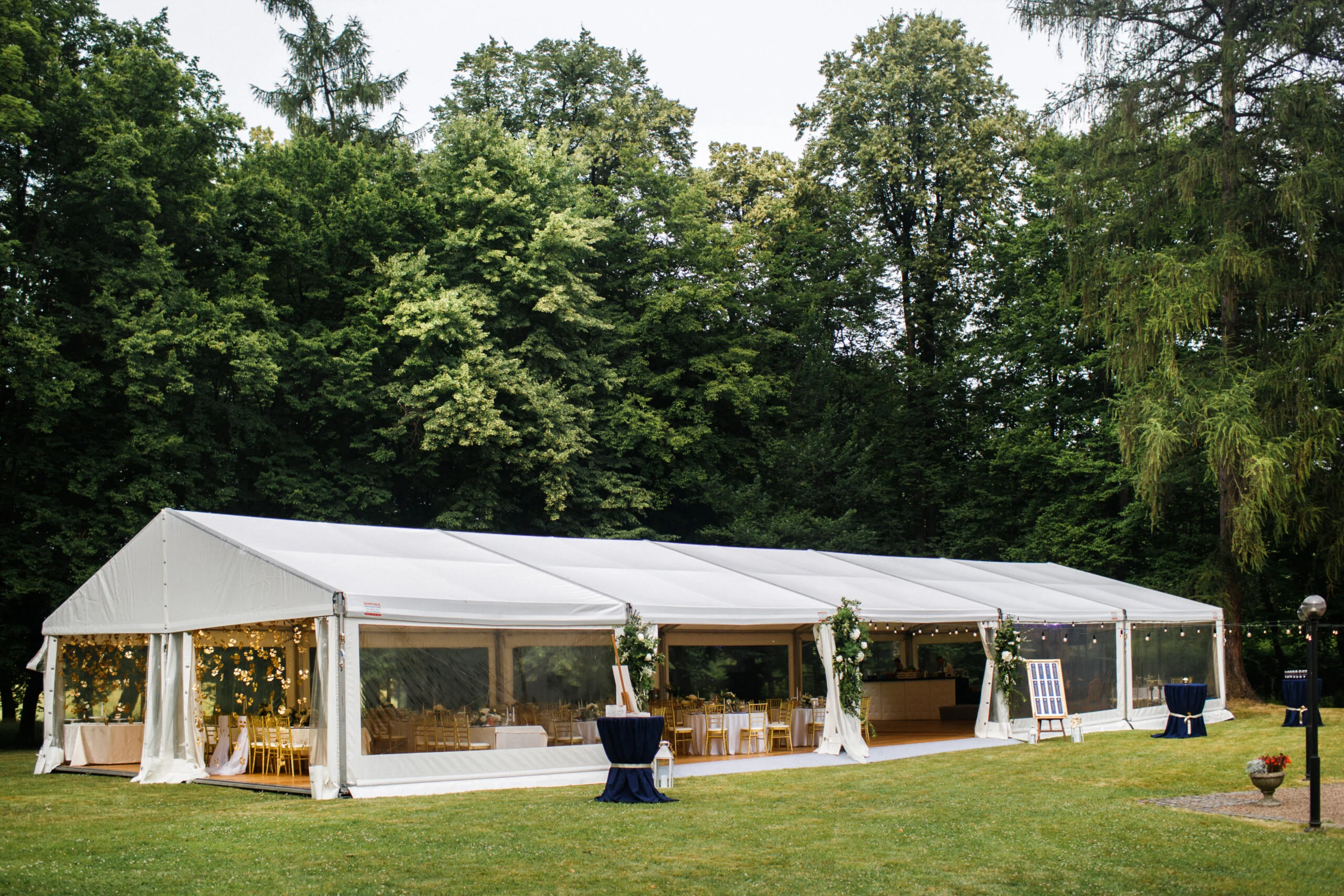 Clearspan marquee with transparent sides on a lawn — example for events in Bowdon