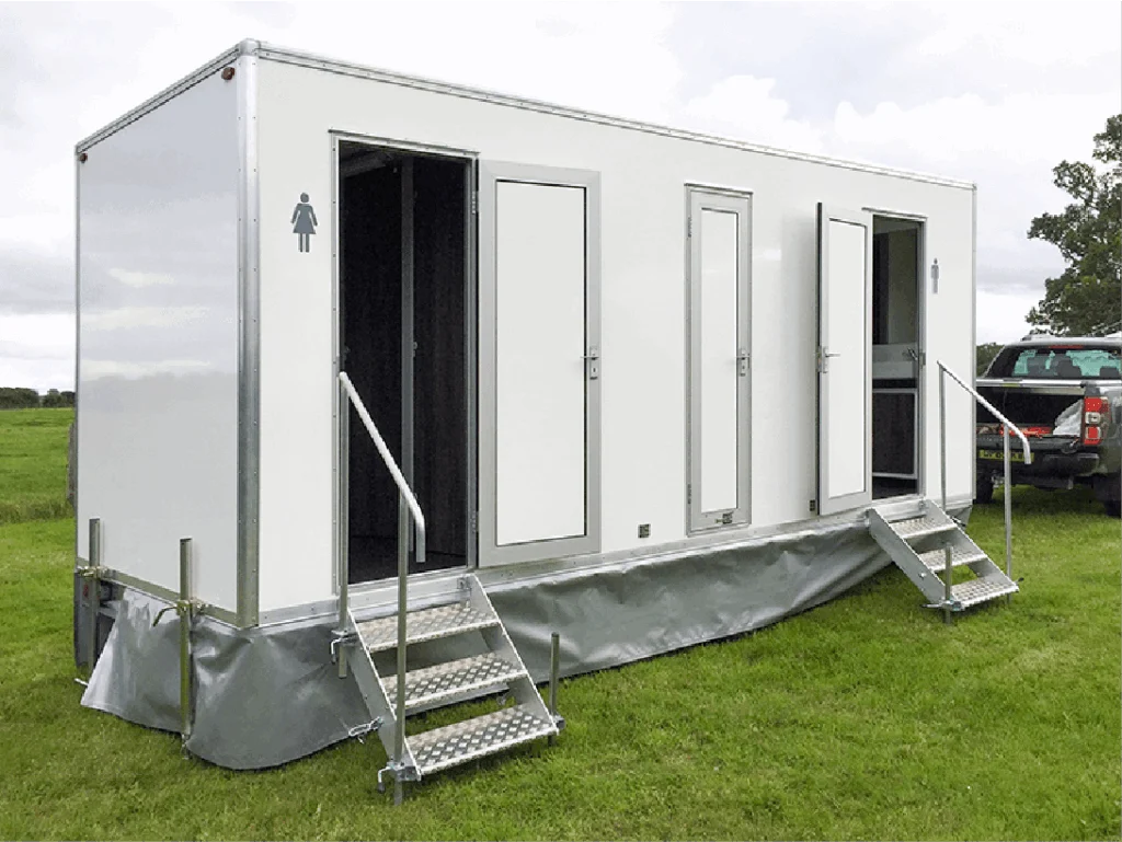 White mobile toilet trailer with access steps