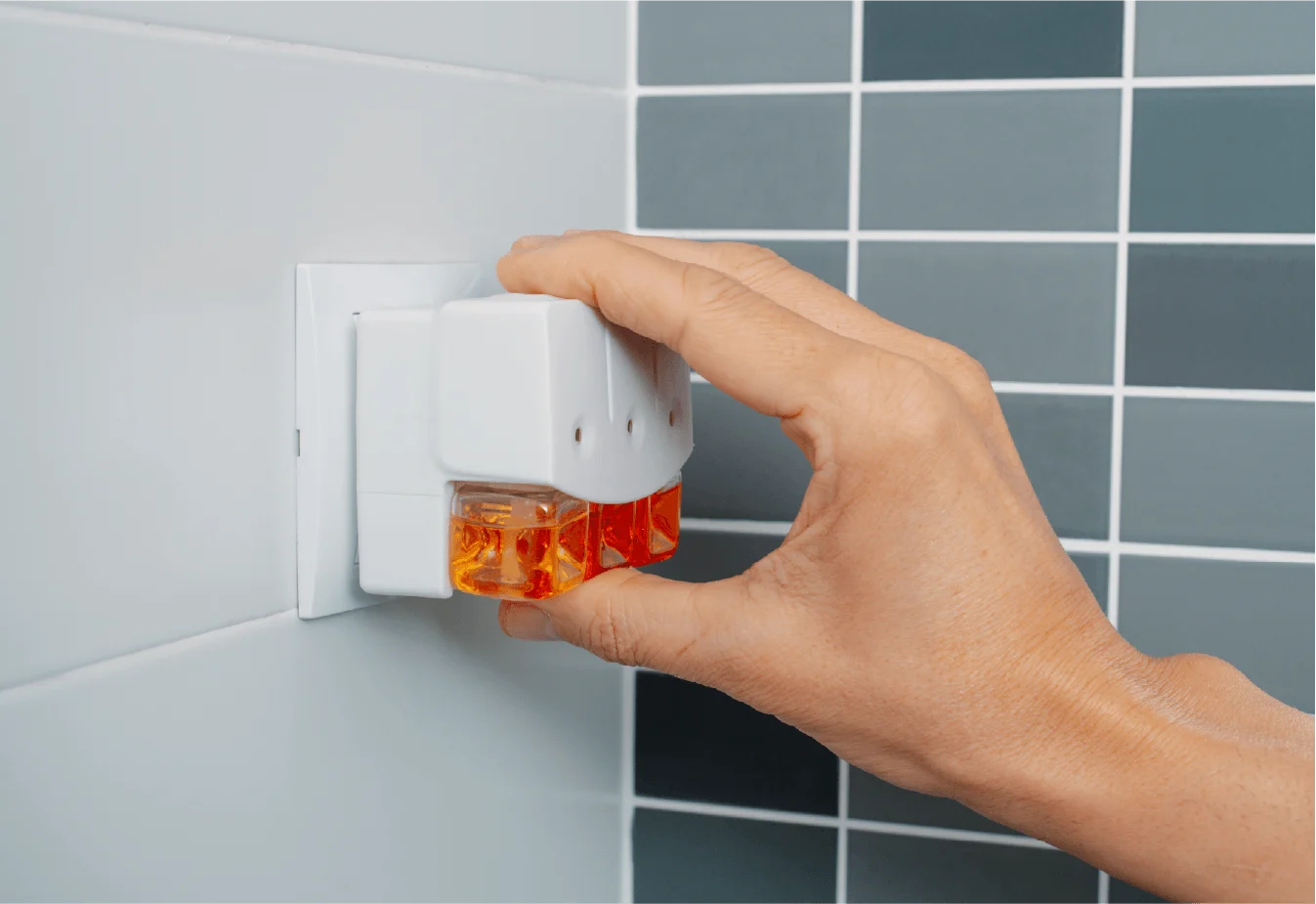 Wall-mounted air-freshener dispenser