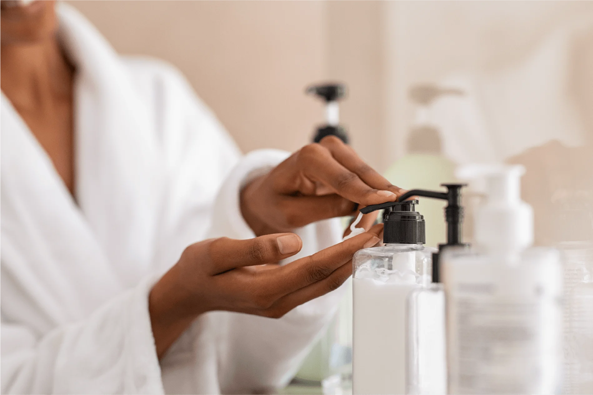 Person using a pump soap dispenser