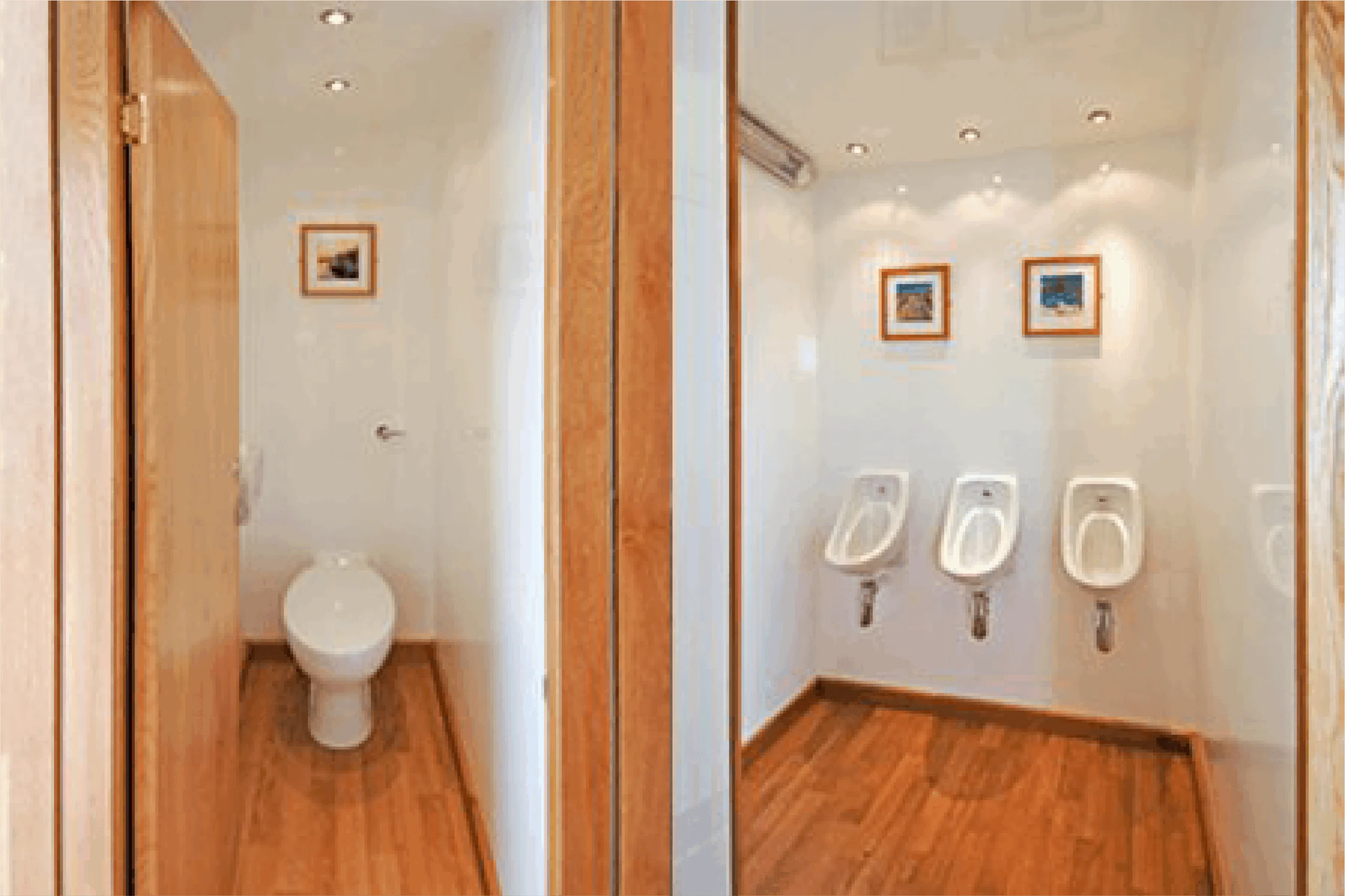 Toilet unit interiors with cubicles and urinals