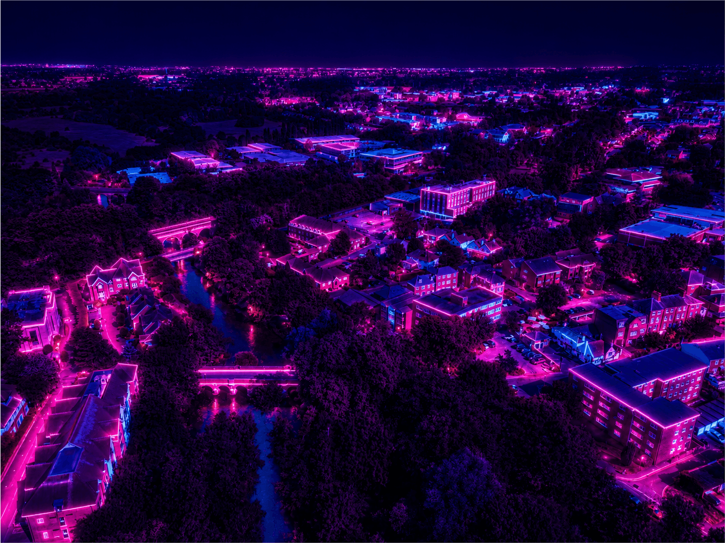 Stylised aerial town view in purple lighting